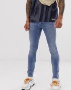 Lyseblå spray on-jeans fra Topman