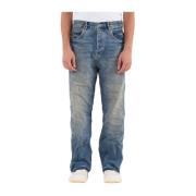 Jeans med fuld lynlås og slidt effekt