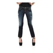 Slim-fit blå denim jeans med vintage maling og hvid læder patch